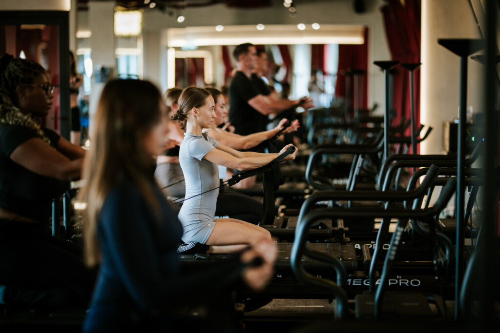 people training at a gym - Lagree vs SolidCore