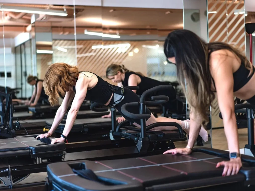 People Exercising - How Often Should You Do Reformer Pilates
