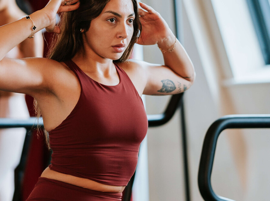 woman focusing on arm - Wedding Arm Workout