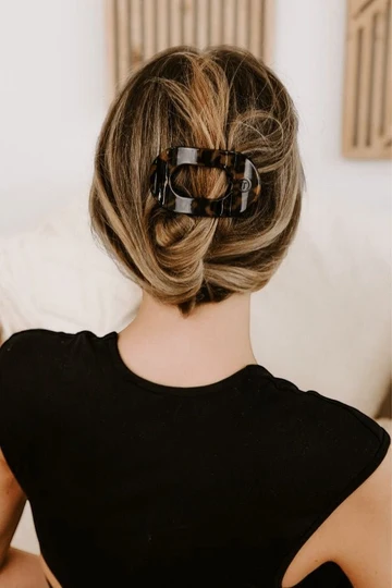  What to Bring to Pilates Reformer Class - hair tie or secure