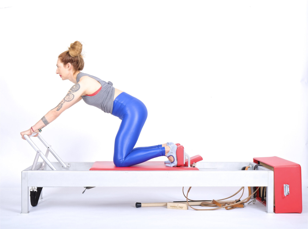  Pilates Reformer Moves Names - knee stretches kneeling carriage