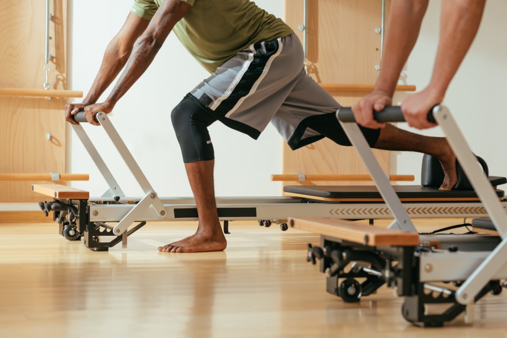  Pilates Reformer Glute Exercises - scooter standing lunge unilateral